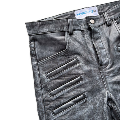 PIERCED; waxed leather pants