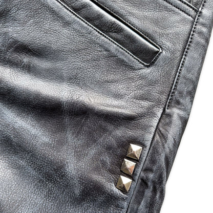 PIERCED; waxed leather pants